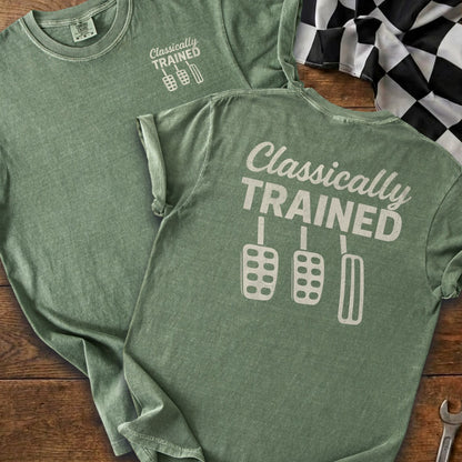 Green t-shirt with "Classically TRAINED" and three pedal graphics.
