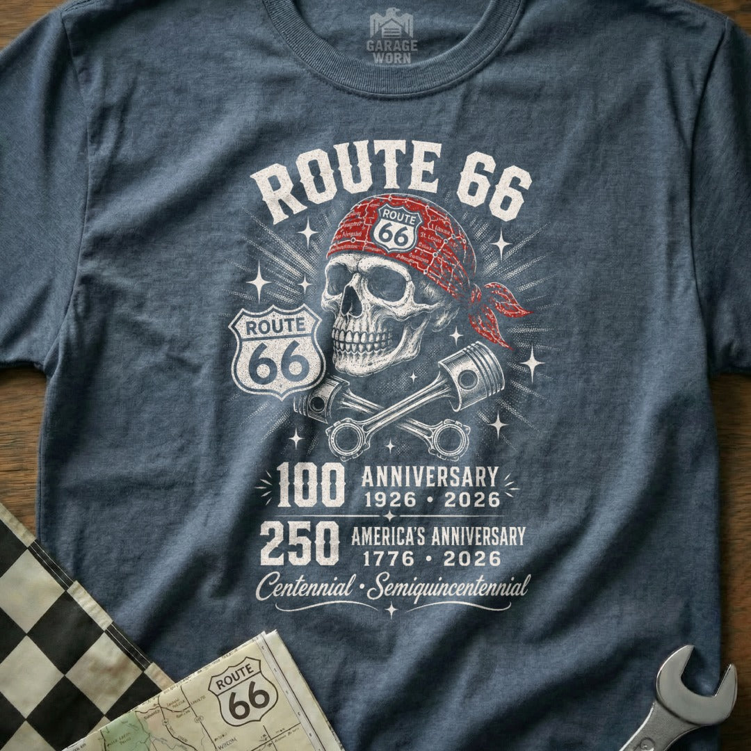 Skull with bandana wearing Route 66 shirt, pistons, and anniversary text.