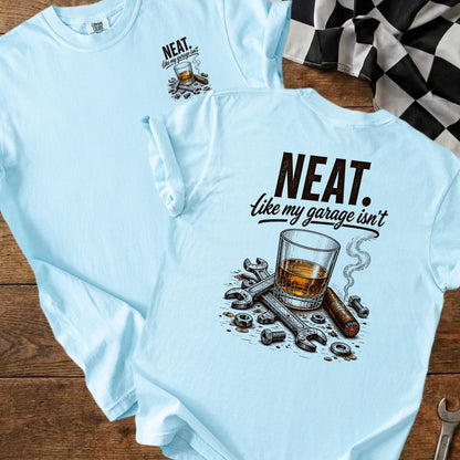 Light blue t-shirt with "NEAT. Like my garage isn't" text and drawing.