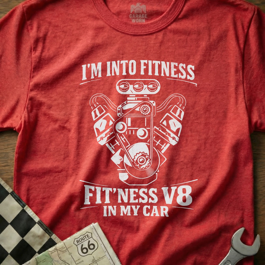 Red t-shirt with white text and engine graphic: "I'M INTO FITNESS FIT'NESS V8 IN MY CAR".