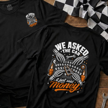 Black t-shirt with "We Asked The Car, It Just Said Money" graphic.