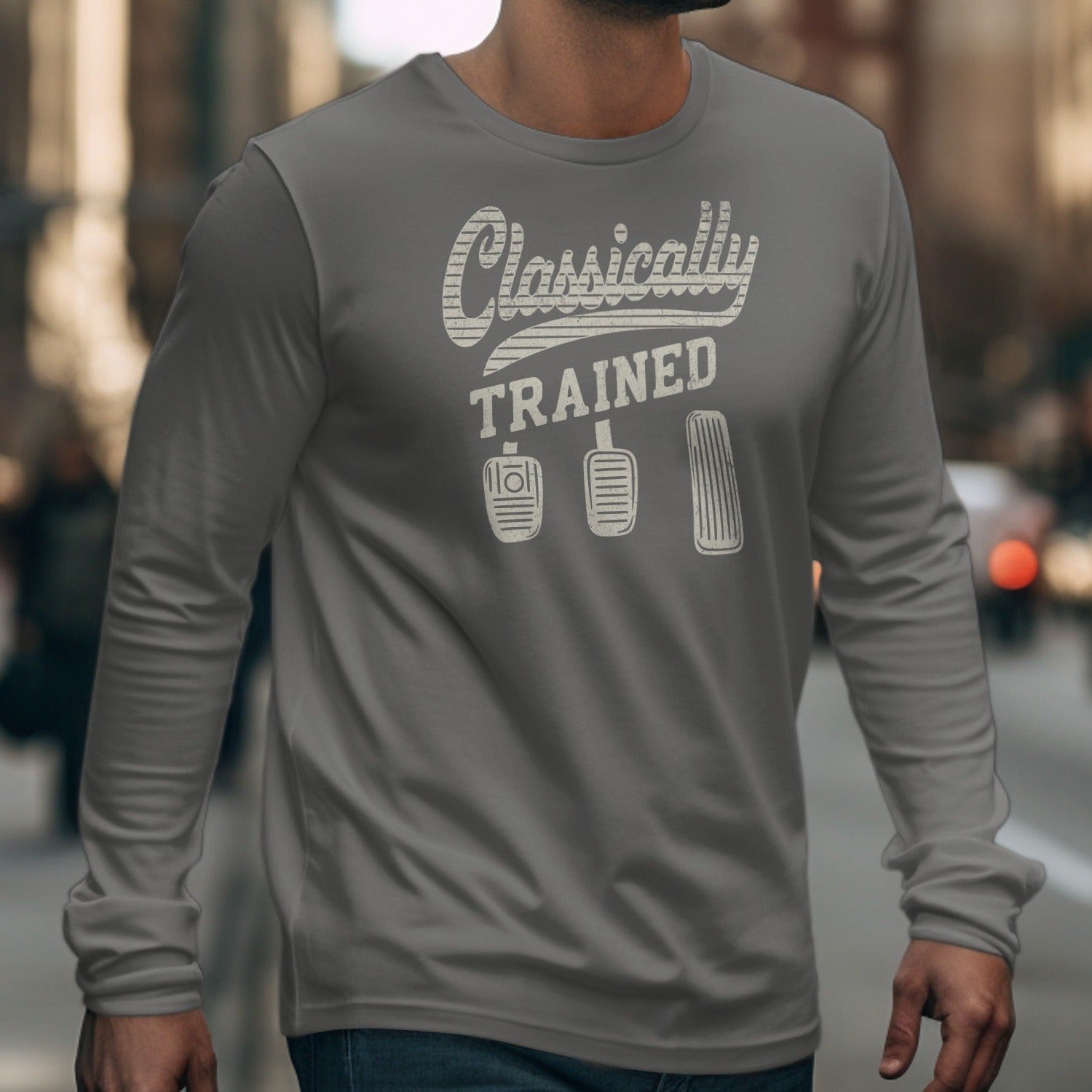 Long sleeve grey t-shirt with "Classically TRAINED" and three pedals graphic.