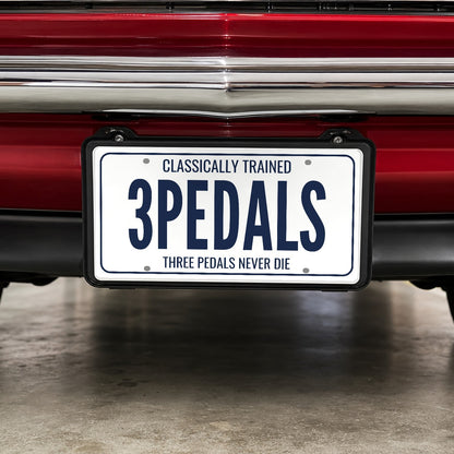 Words only vanity plate on a red classic muscle car