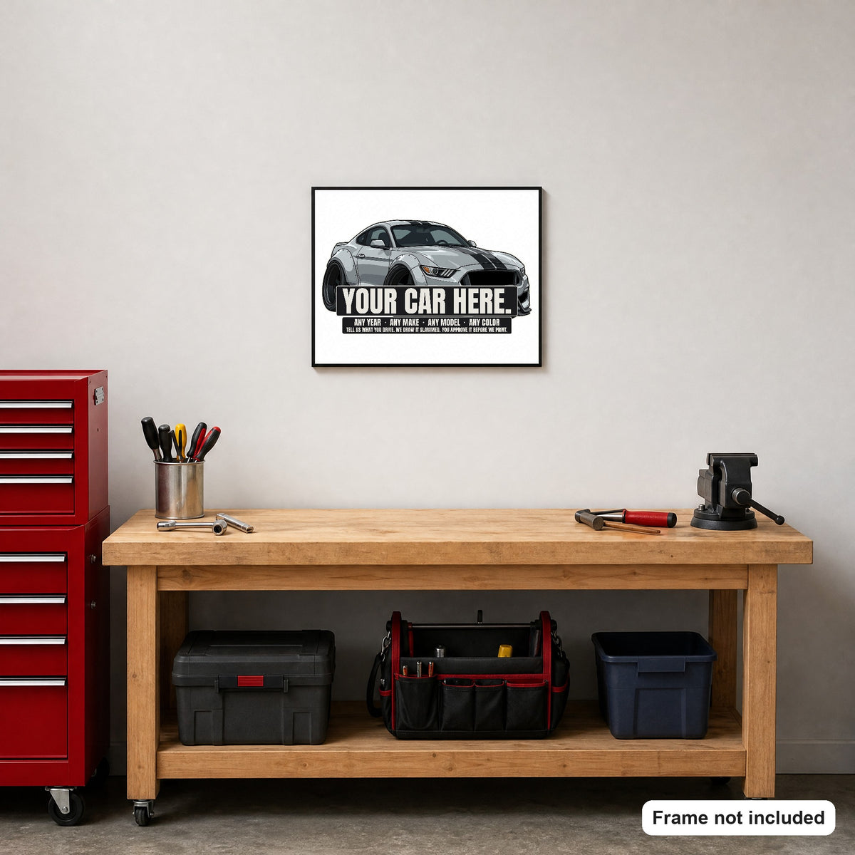 Your car here - poster framed above a garage workbench (frame not included)