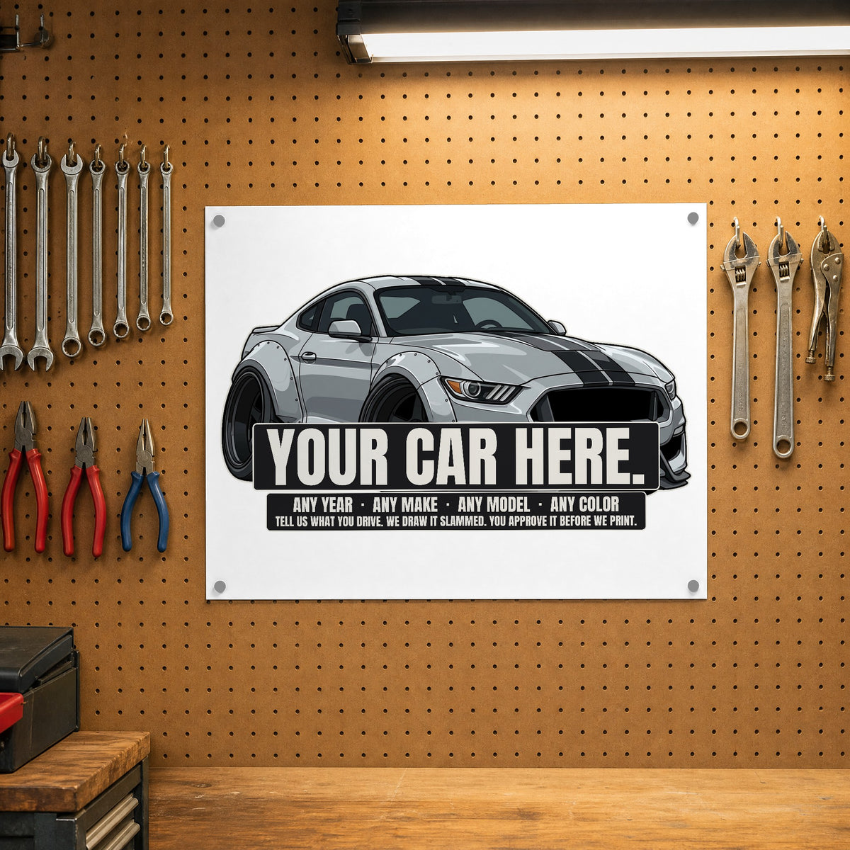 Your car here - poster on a garage pegboard